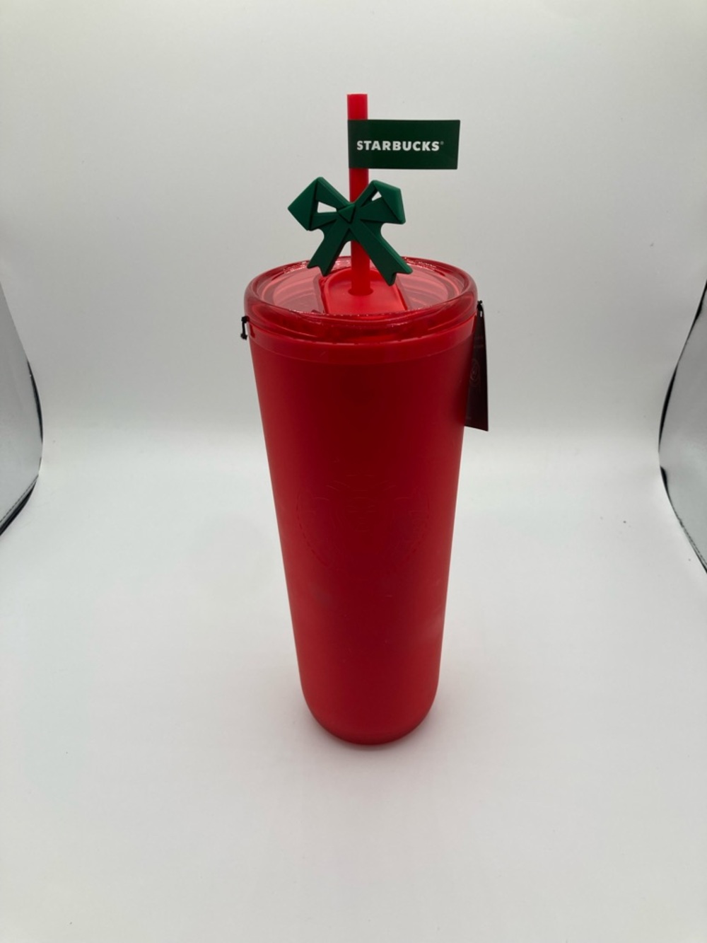 Starbucks 2025 Holiday Red Soft Hot/Cold Cup Ribbon Charm Tumbler 24oz in hand